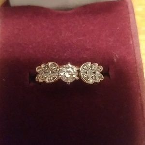 Diamond solitaire ring with saudered ring guard